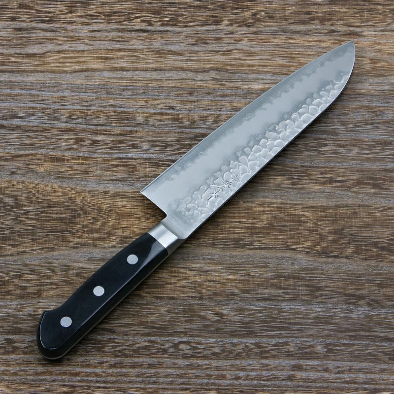 青馬 三徳包丁 両刃 180mm 青紙スーパー鋼 割込み ステンレス 槌目仕上げ 共口金付き 黒合板柄 裏